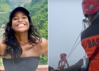 Caso Juliana Marins: Corpo de turista brasileira é içado de vulcão e levado de maca até a base