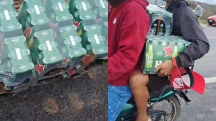 Caminhão carregado de Heineken tomba e carga é saqueada por populares em estrada na Bahia
