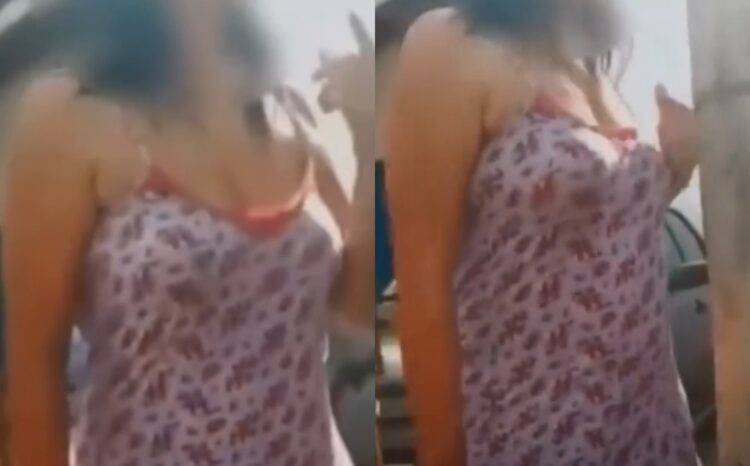 Mulher recebe técnicos de energia usando roupa íntima e portando arma