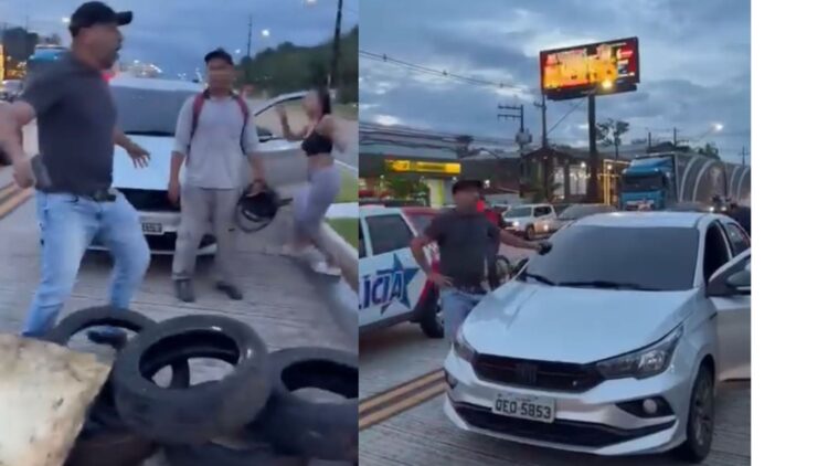 Homem aponta arma para manifestantes durante protesto na Augusto Montenegro, em Belém