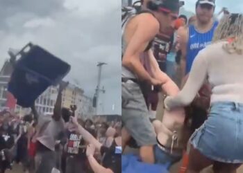 Homem arremessa lixeira para o alto durante show em festival de Rap e acaba atingindo mulher